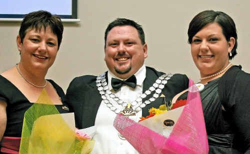 Former Warwick man Chris Morahan celebrates his new appointment with wife Ruth (left) and daughter Danielle. Former Warwick man Chris Morahan celebrates his new appointment with wife Ruth (left) and daughter Danielle.